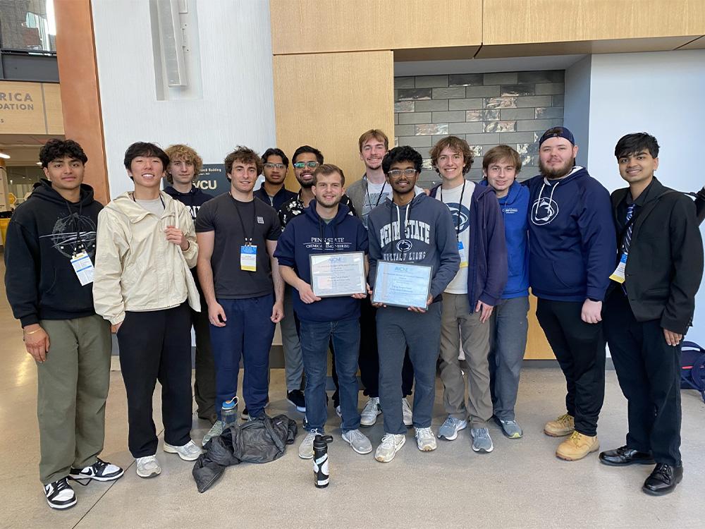 Penn State students posing with Chem-E-Car certificates
