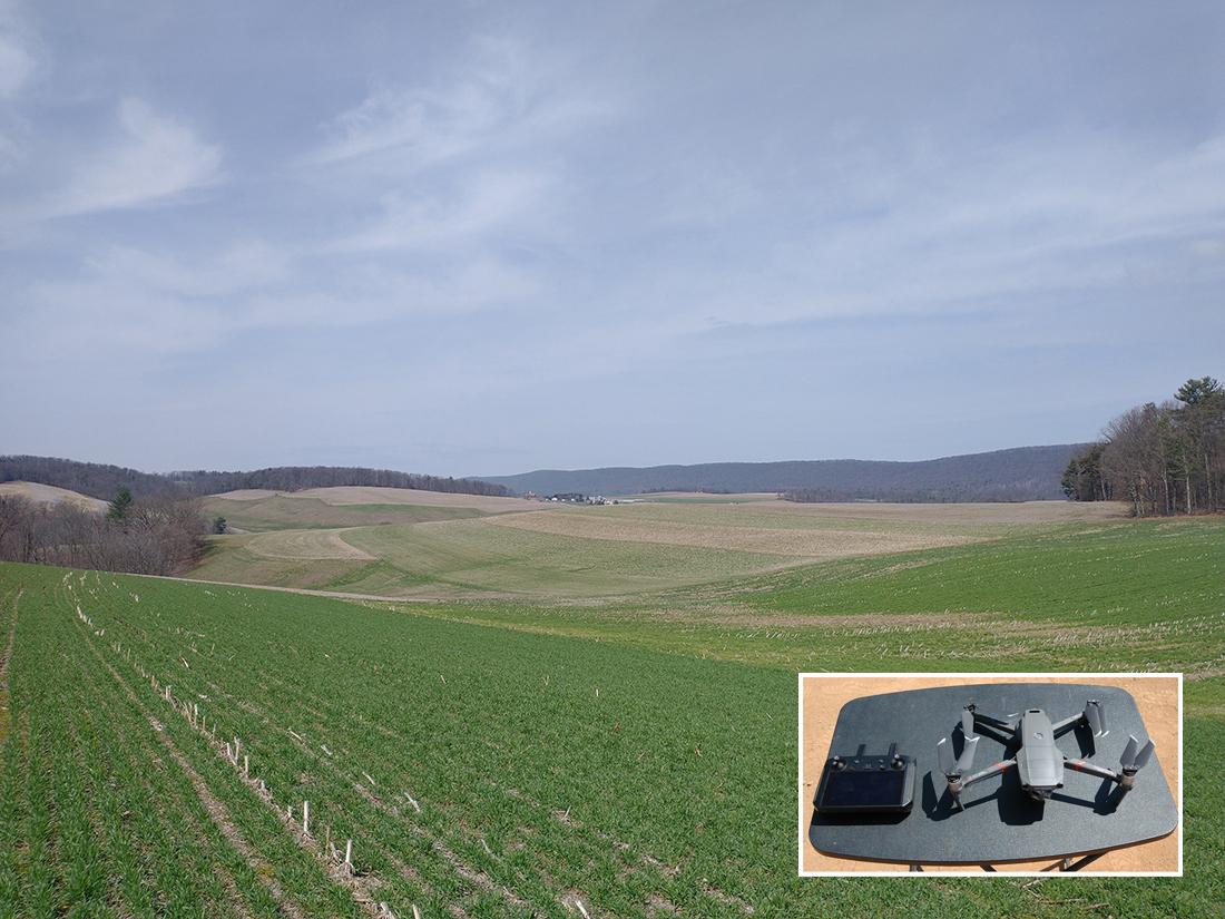 drone, controller on table in field