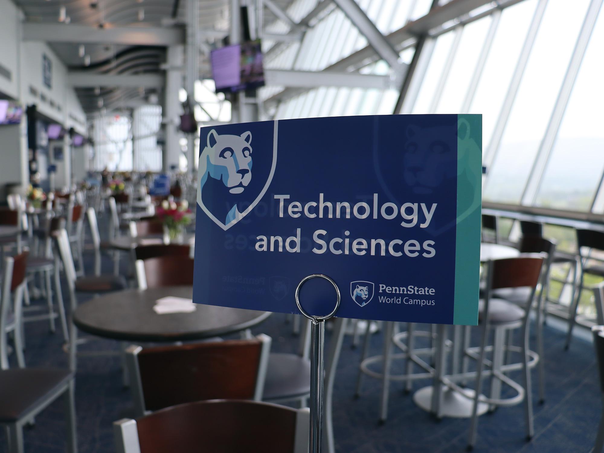 A sign in a lounge area. "Technology and Sciences."