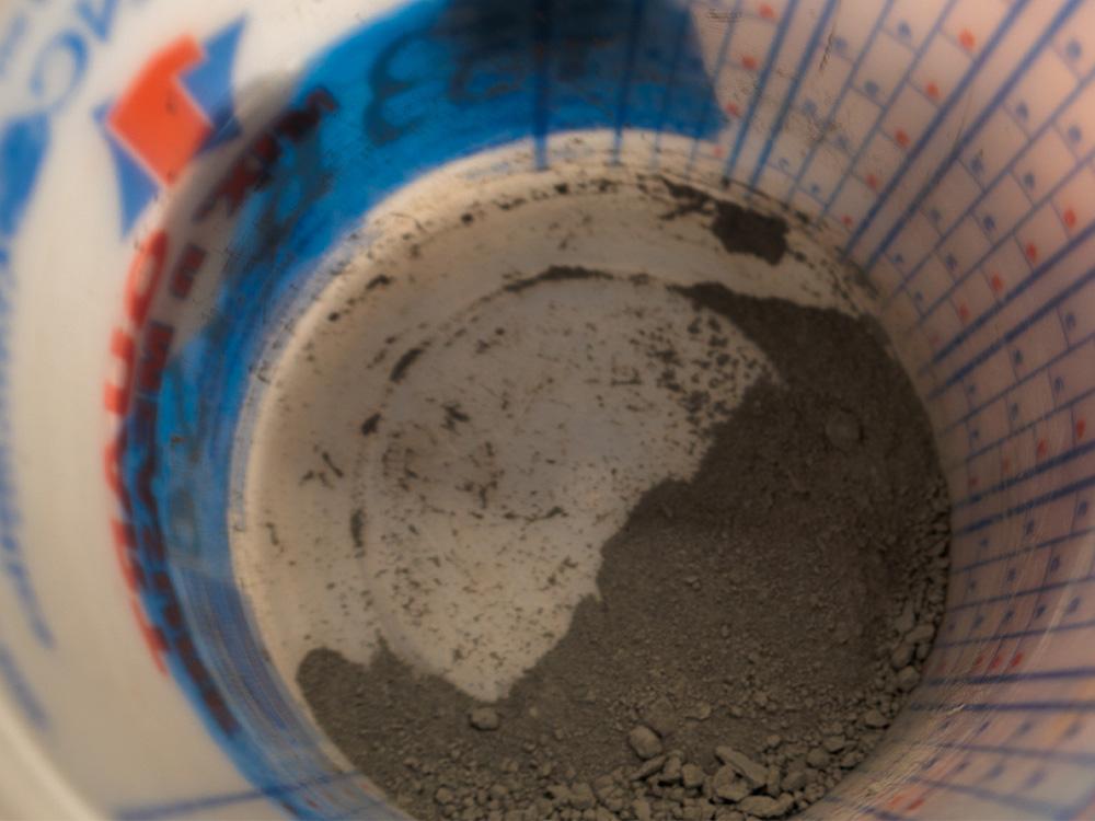 Basaltic fines in a container