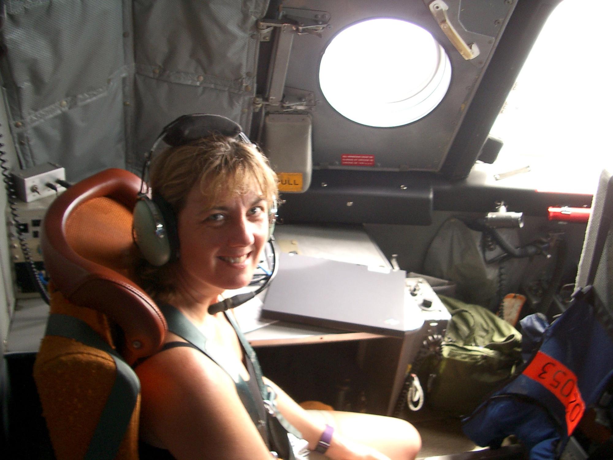 Jenni Evans flies in the eye of a Category 5 storm in 2004.