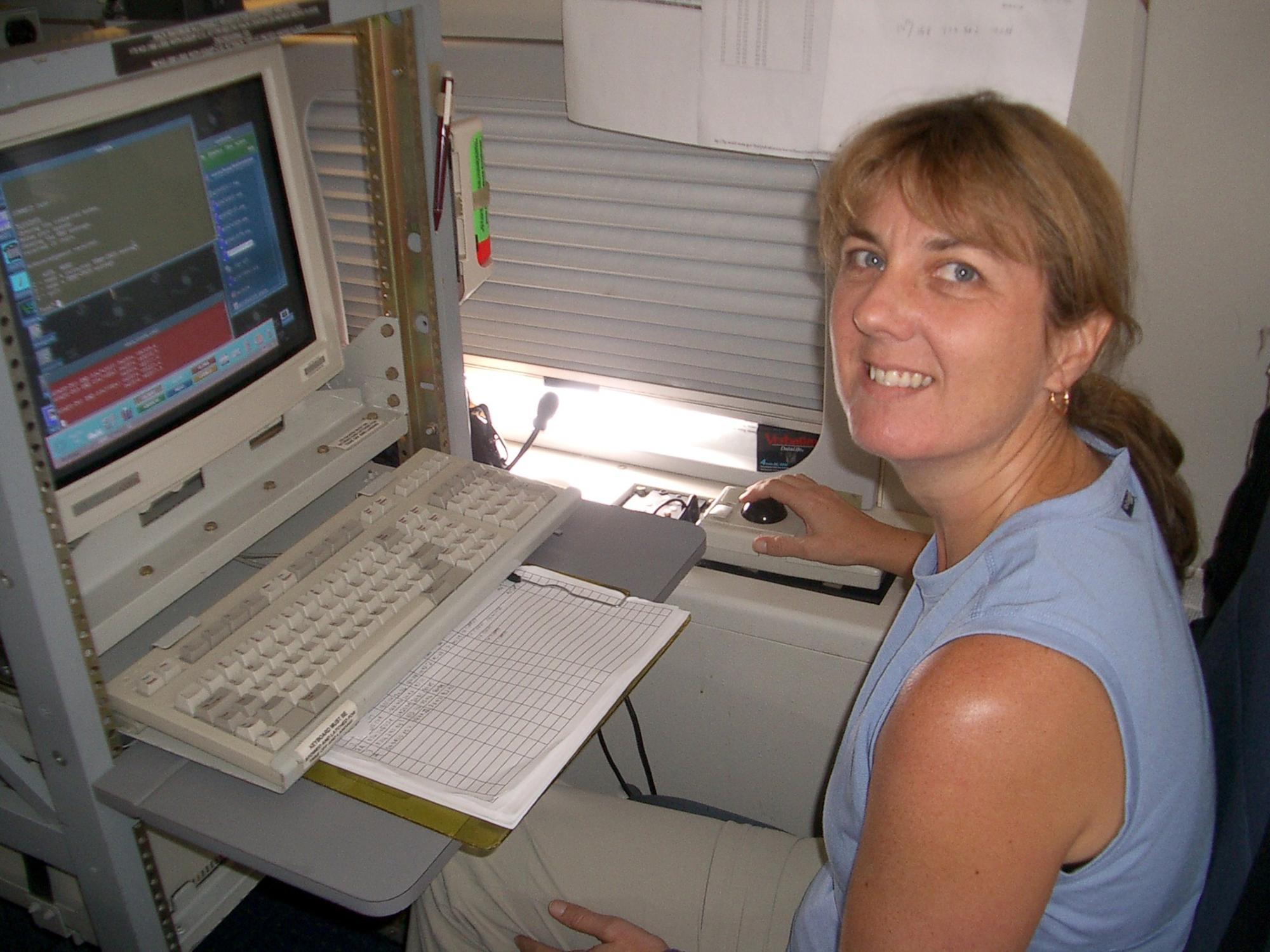 Jenni Evans at a computer