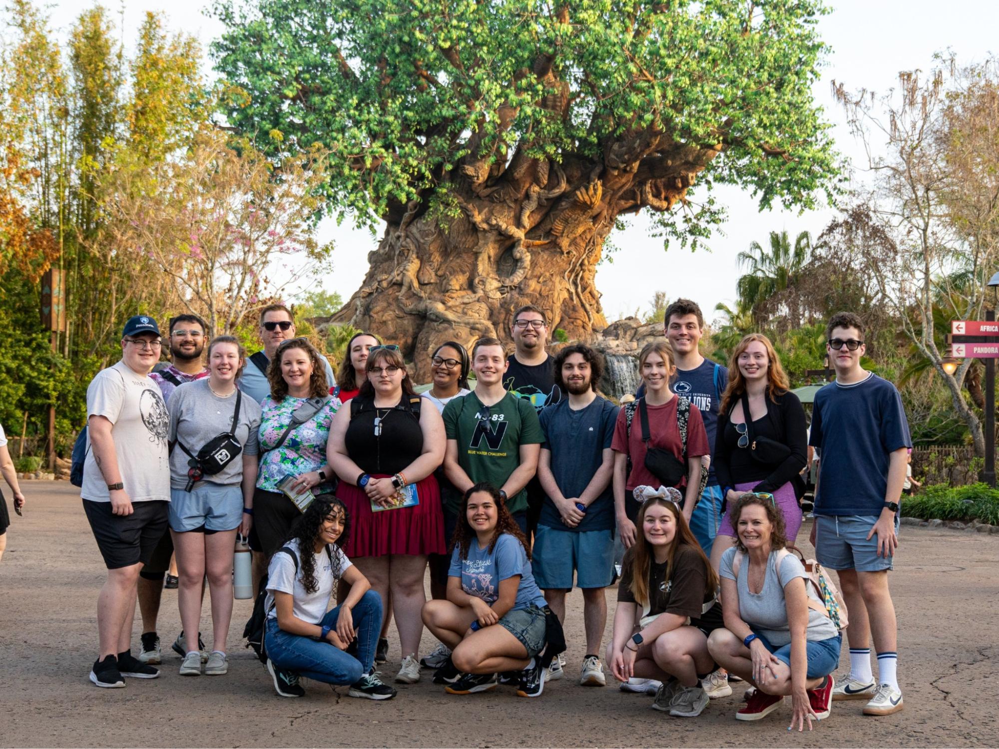 Students gather in front of Disney's Tree of Life