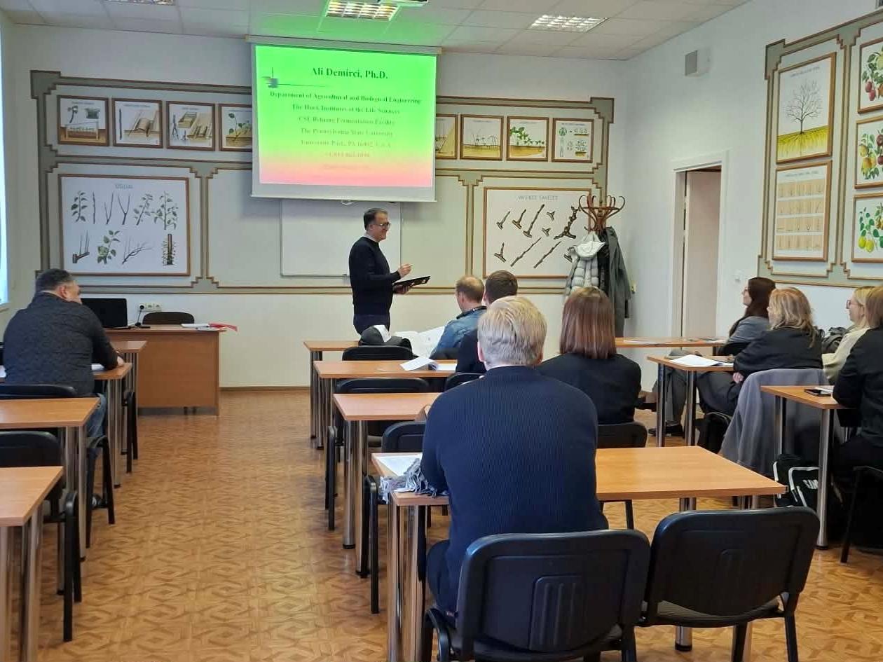 Penn State professor Ali Demirci presenting a class in Lithuania.