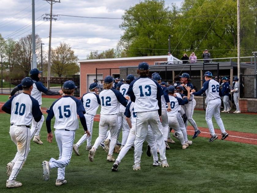 Baseball players congratulating one another.