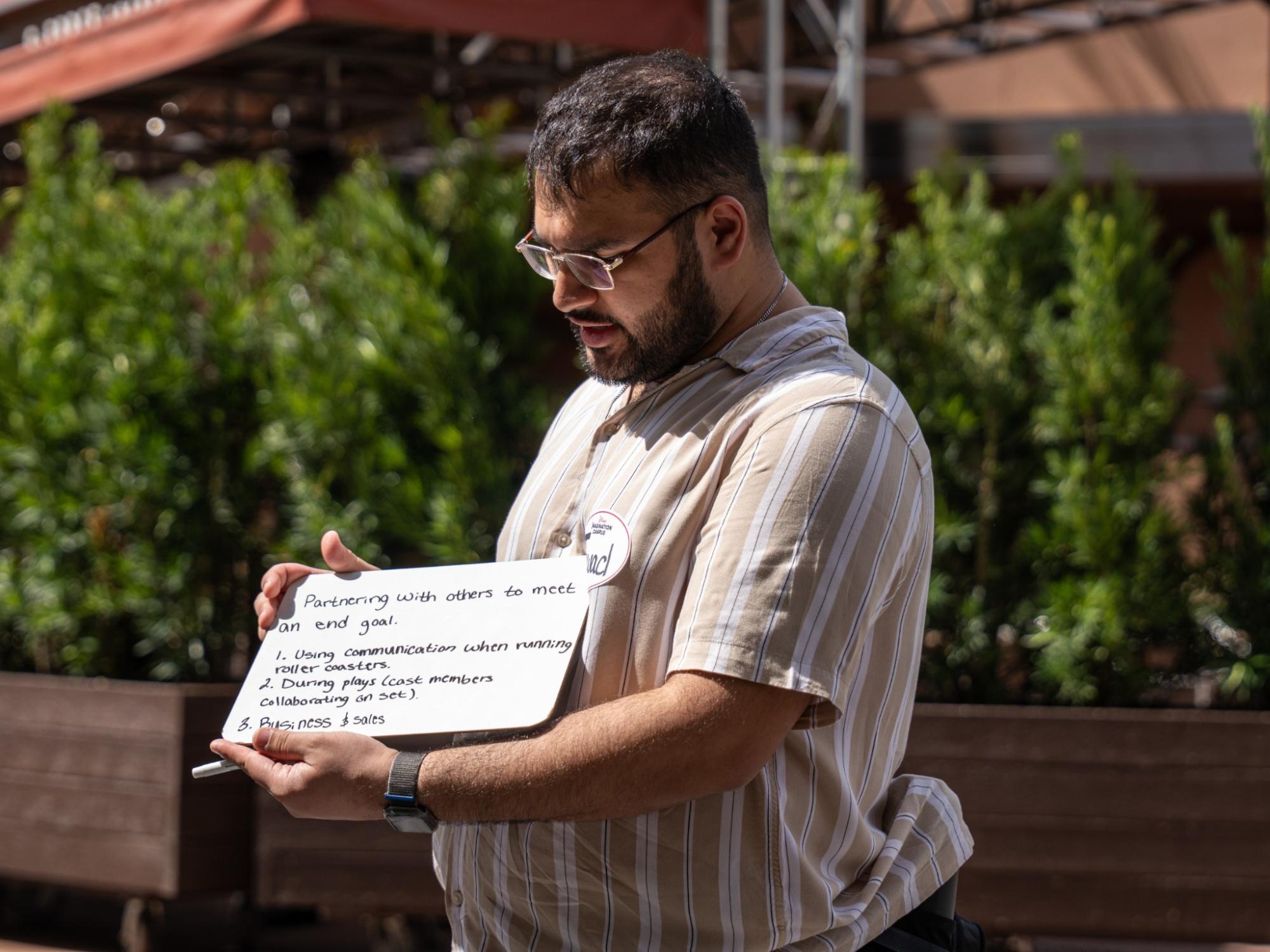 A student presents ideas during a leadership workshop.