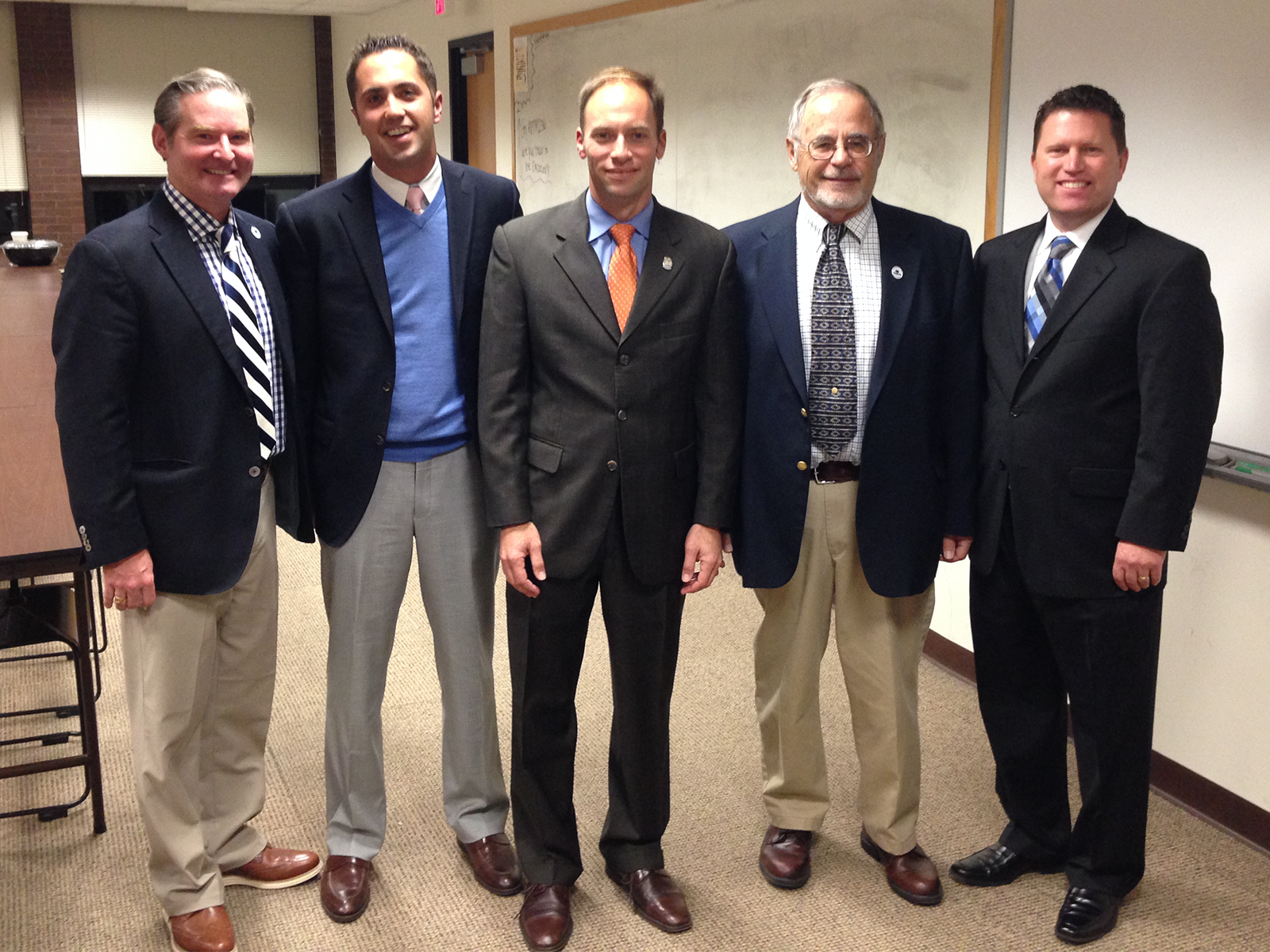 Frank Guadagnolo with alumni and faculty