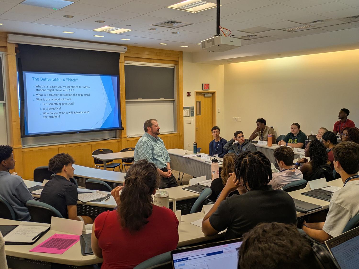 Shawn Dommer, assistant director for co-curricular engagement in the Smeal Center for Business Ethics and Social Responsibility, addresses the 2026 BOSS cohort.
