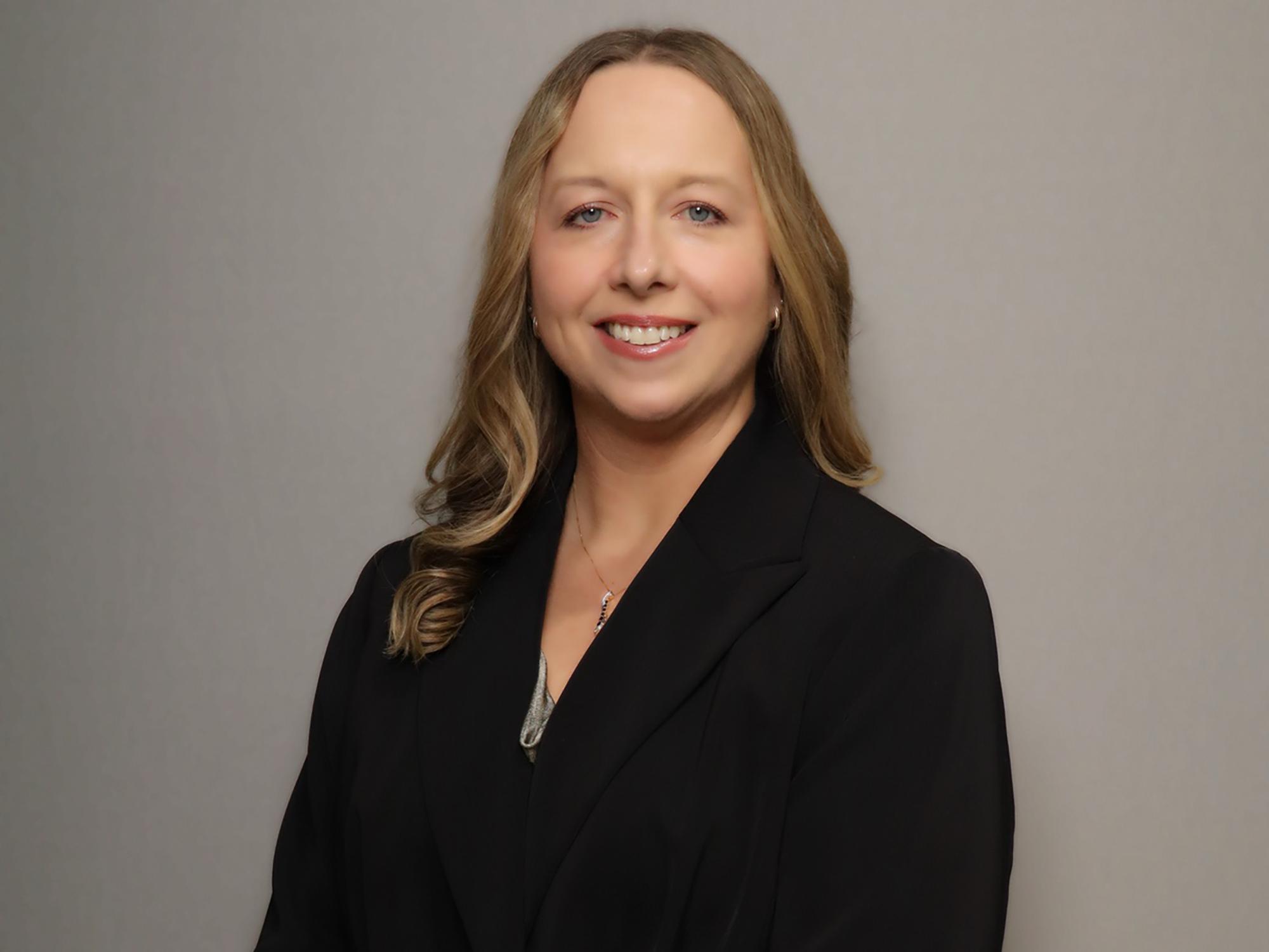 A headshot image of Lindsey Simon-Jones.