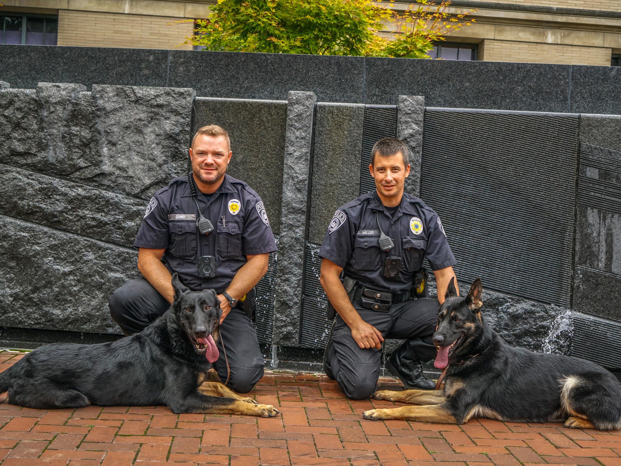K-9s Zain and Bo with handlers Officer Josh Quimby and Officer Dustin Miller