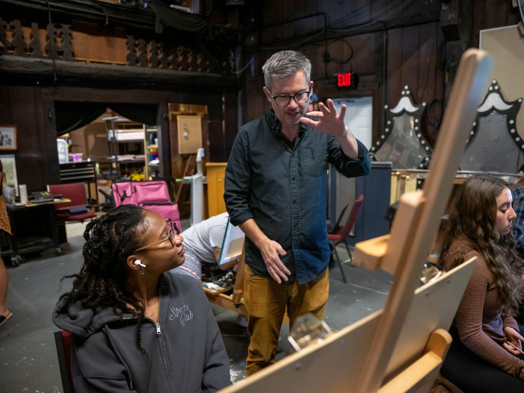 Penn State Behrend faculty member Dan Schank teaches an art class in Mary Behrend's Studio.