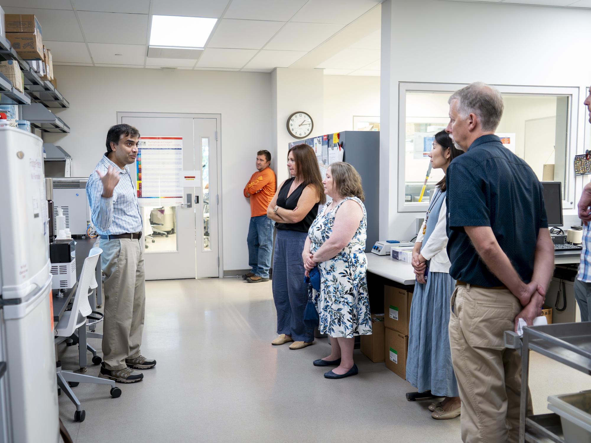 Flow Cytometry Core Facility Director Rajeswaran Mani speaks to tour attendees ahead of the Huck Institutes 30th Anniversary Event. August 28, 2026