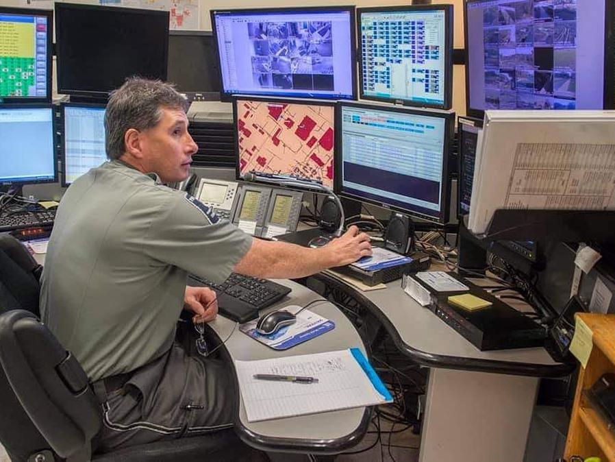 A man at a series of monitors