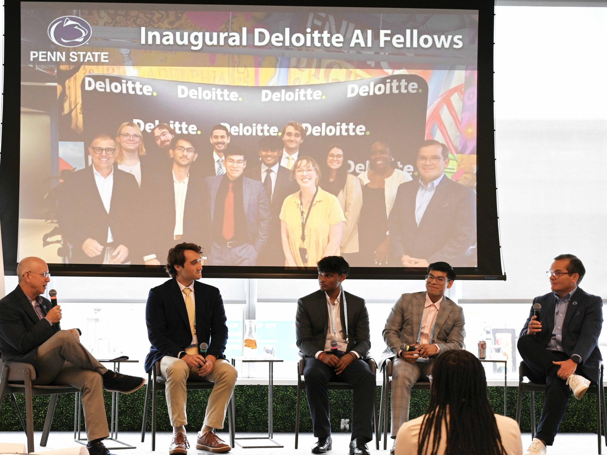 Speakers during a conference panel