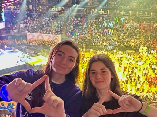 Colleen McKenzie and Miriam Gutensohn in the stands of the Bryce Jordan Center at THON.
