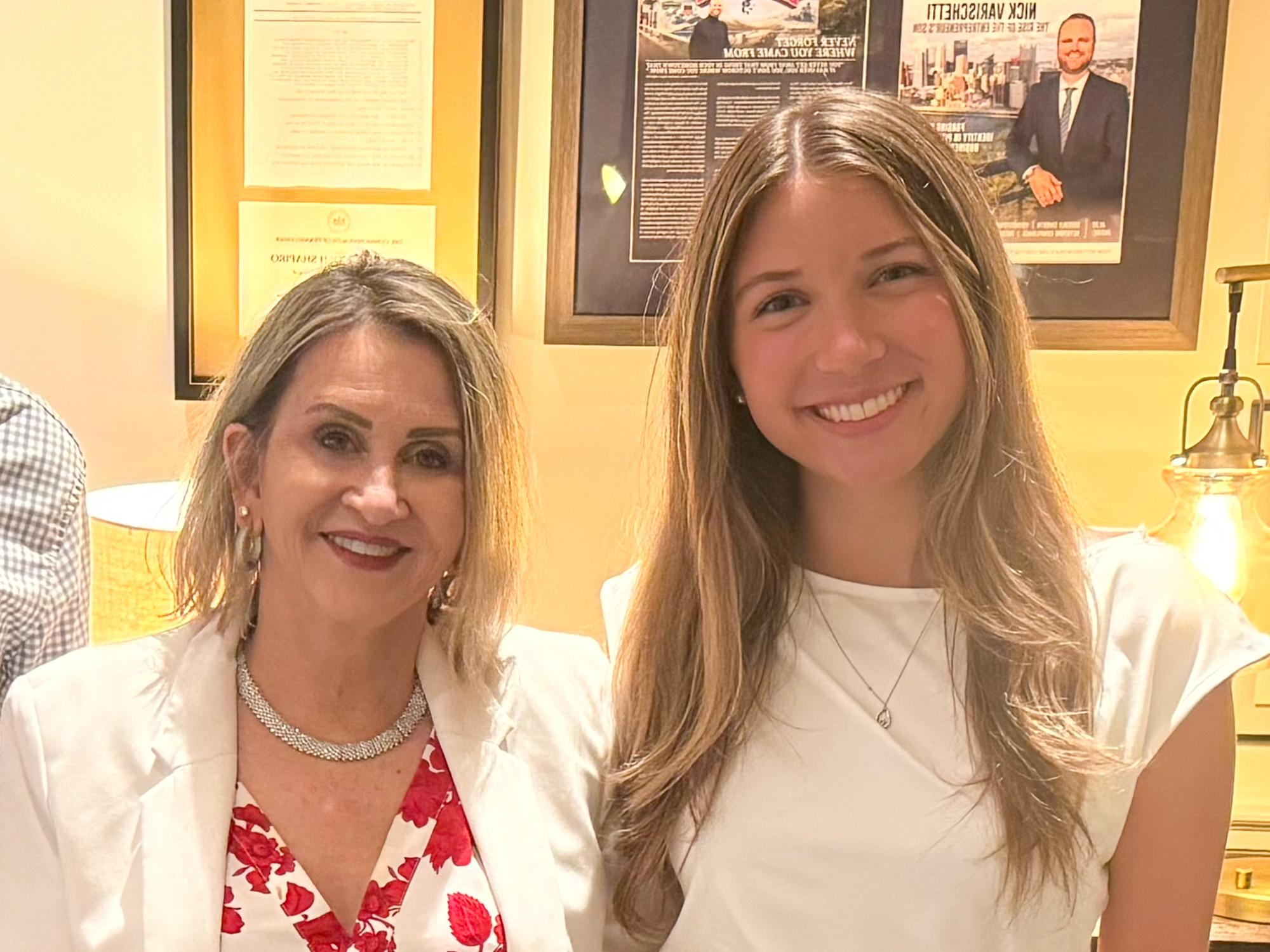 Alexa Pippy stands smiling beside Pennsylvania Senate President Pro Tempore Kim Ward indoors.