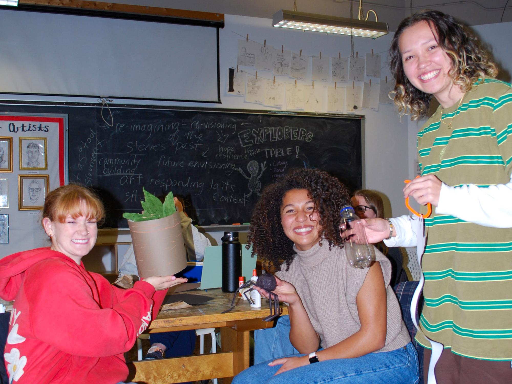 Sonia Lloyd stands alongside two fellow Penn State students in the Pennsylvania Art Education Association. 