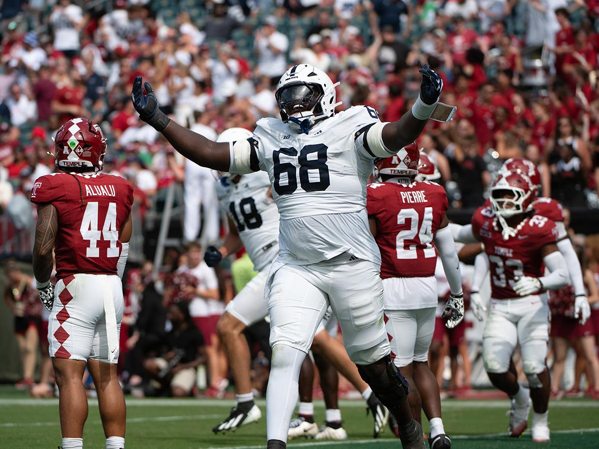 Player celebrates with hands up