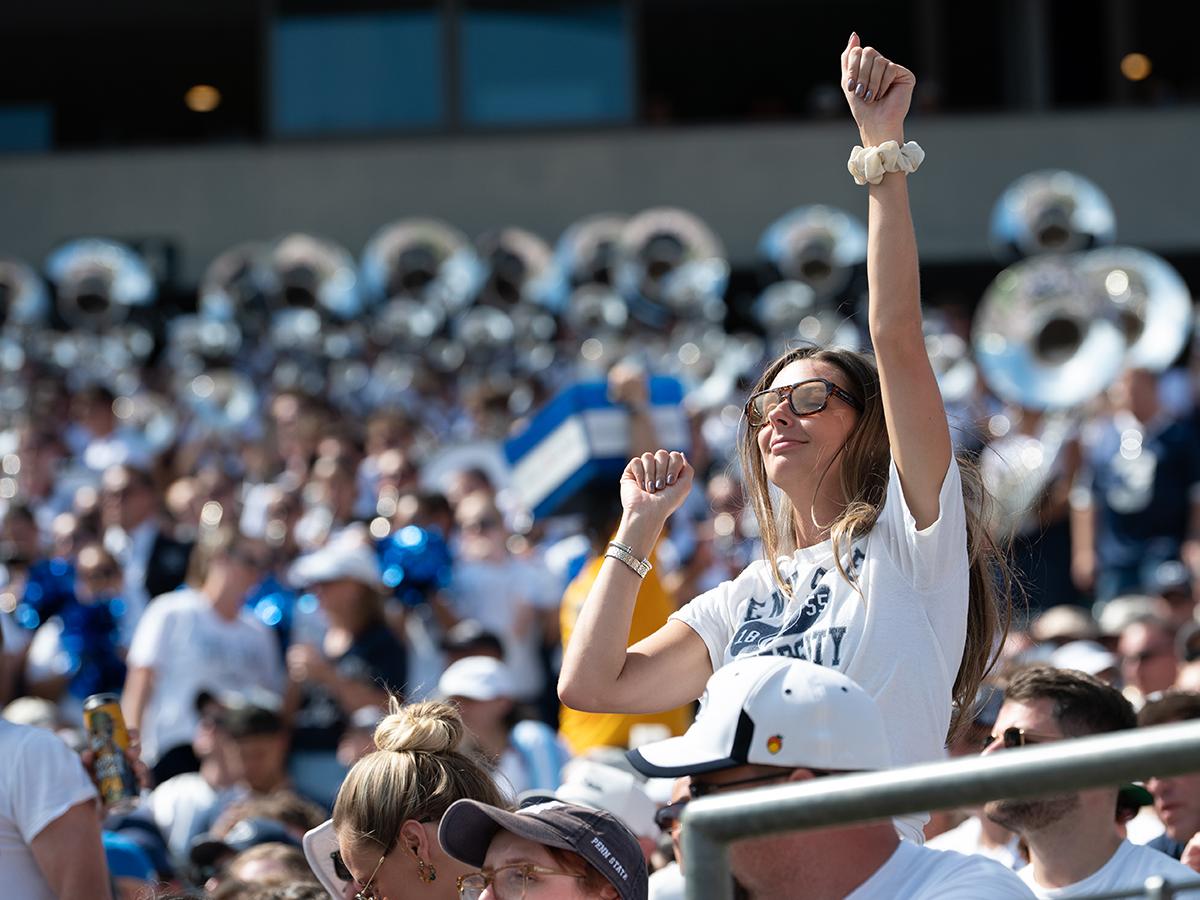 Female fan celebrates