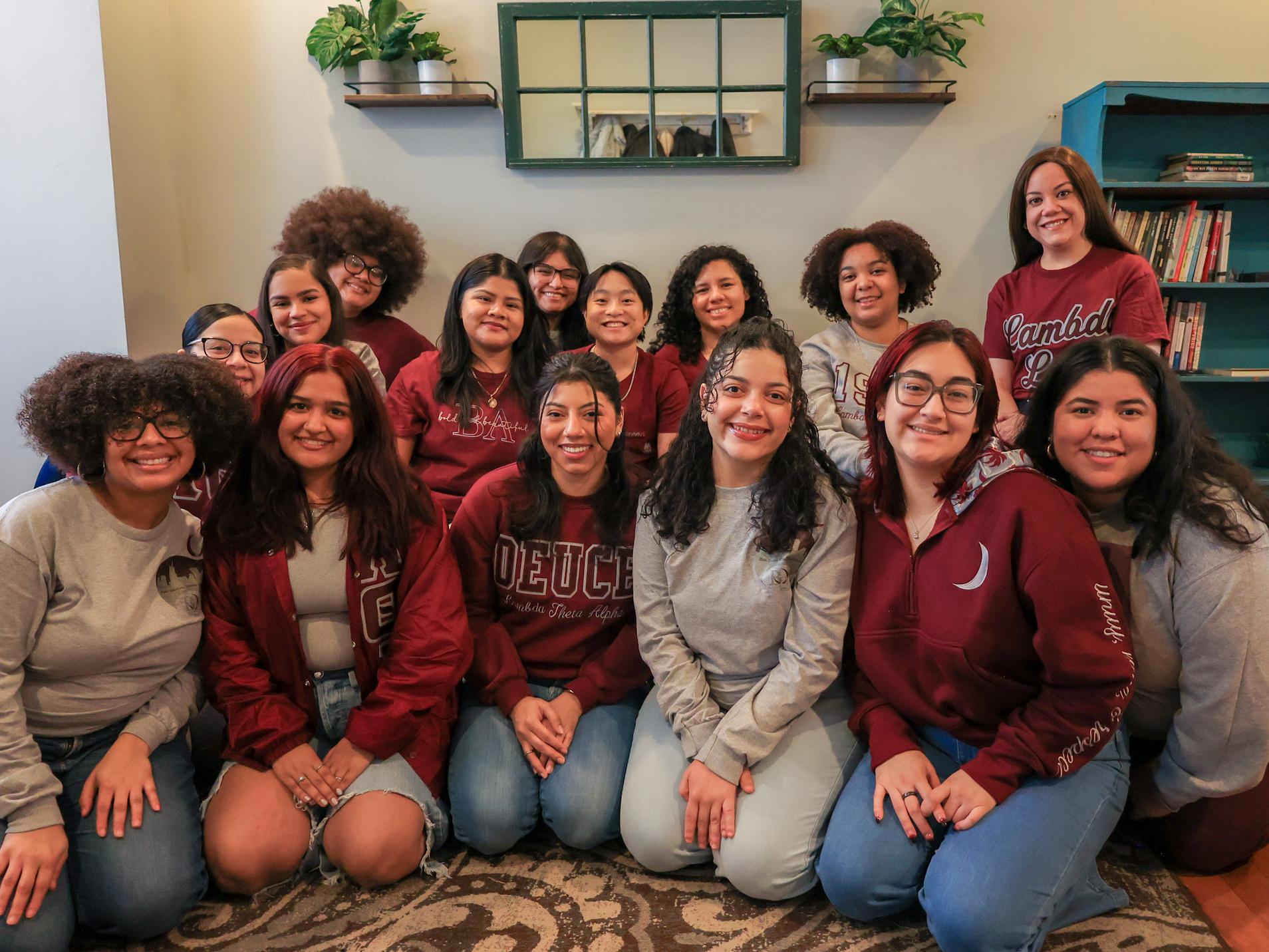 Members of Lambda Theta Alpha Latin Sorority, Inc. pose for a photo.