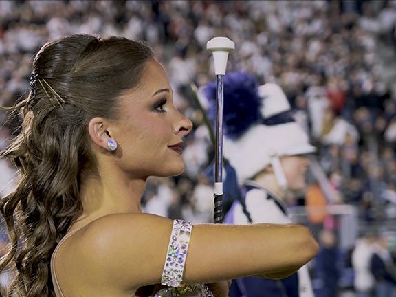 Female baton twirler with dark hair
