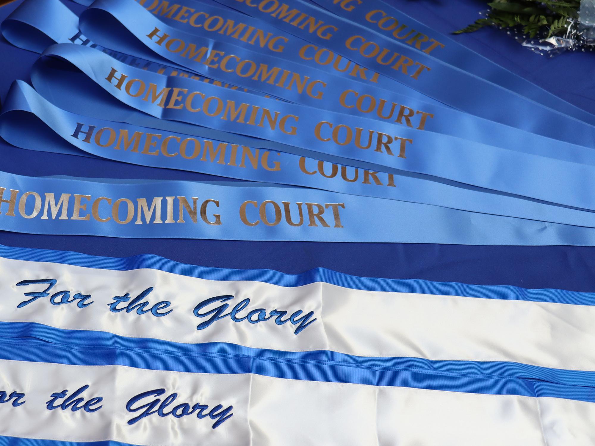 Blue and white sashes.