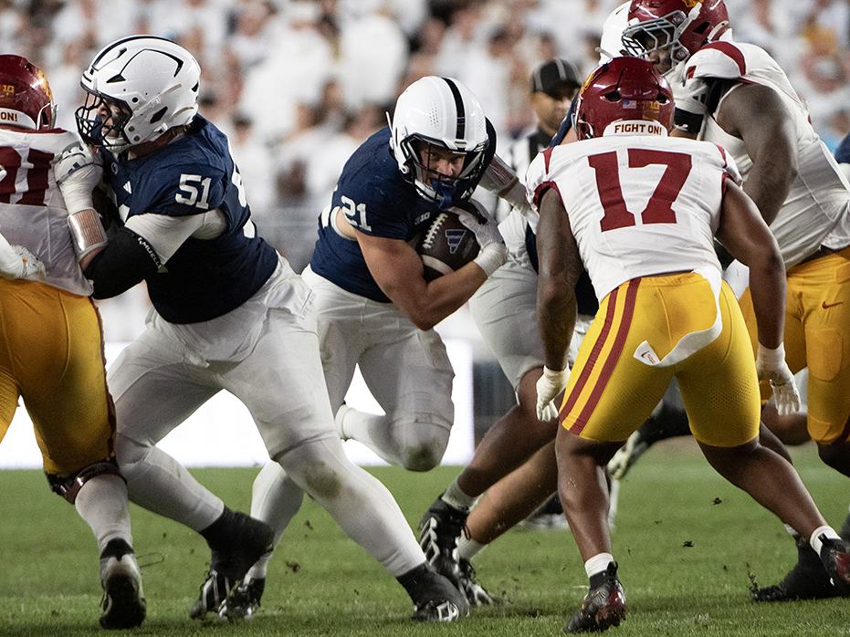 Running back runs through gap