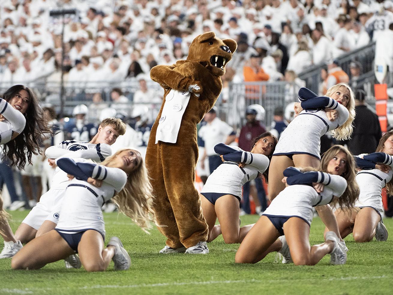 Nittany Lion performs with dance team