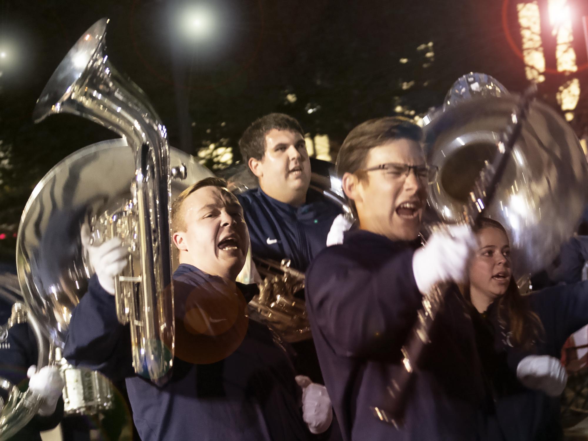 Blue Band dancing in street 