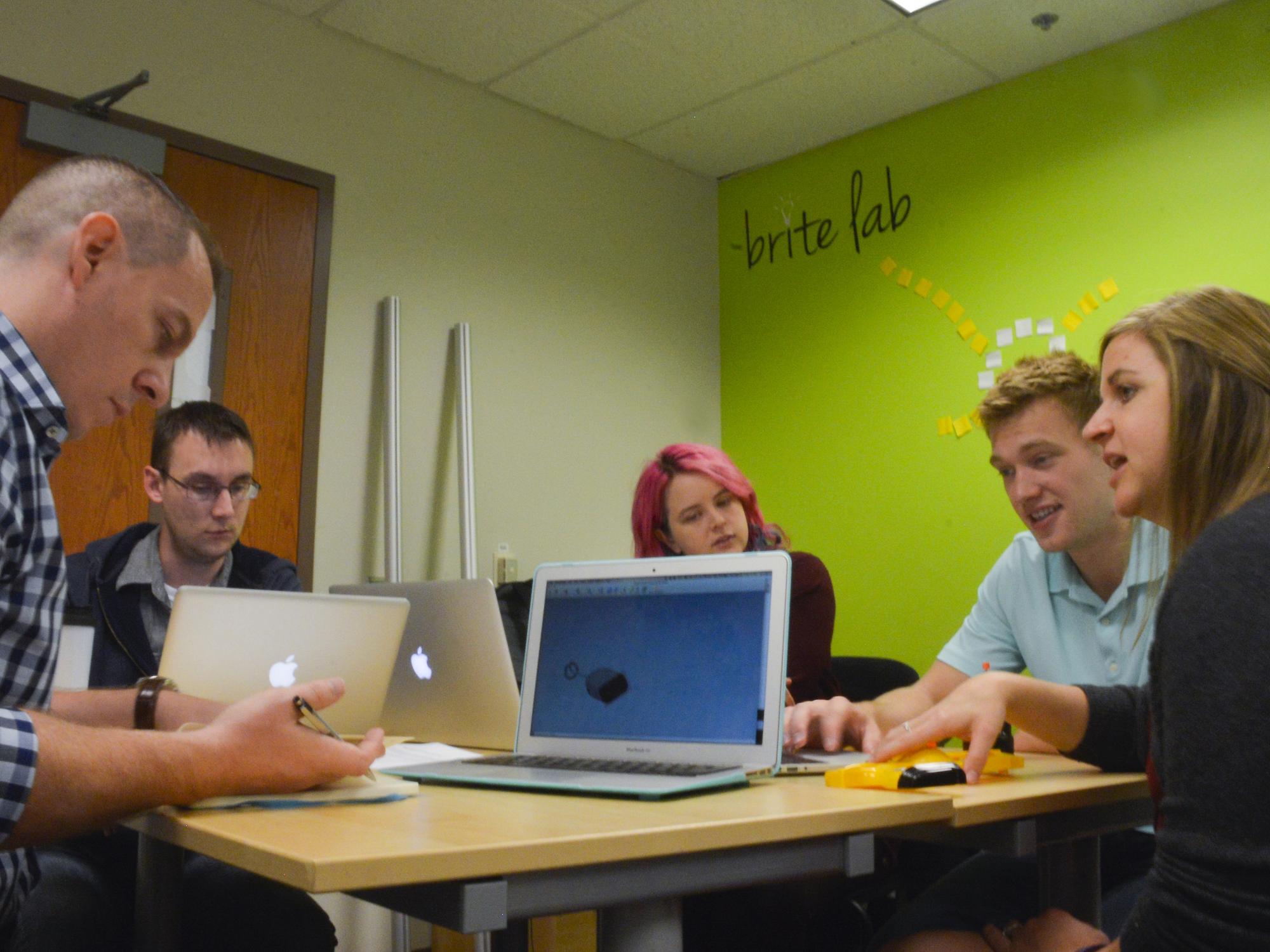 The research team discusses how to study engineering learning and innovation with product dissection activities in engineering design courses at Penn State. 