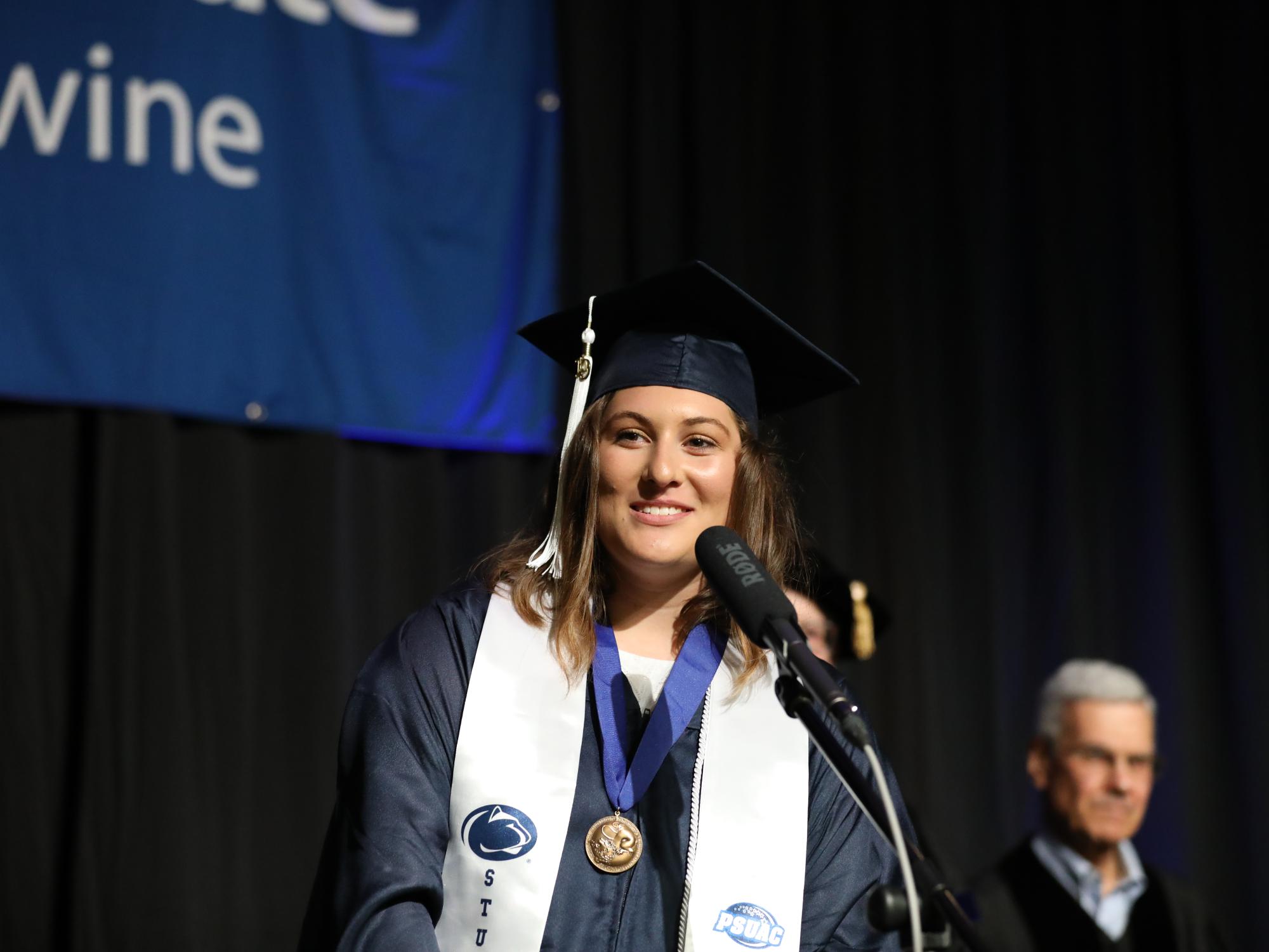 Maddie Malfara speaks at Penn State Brandywine's commencement. 