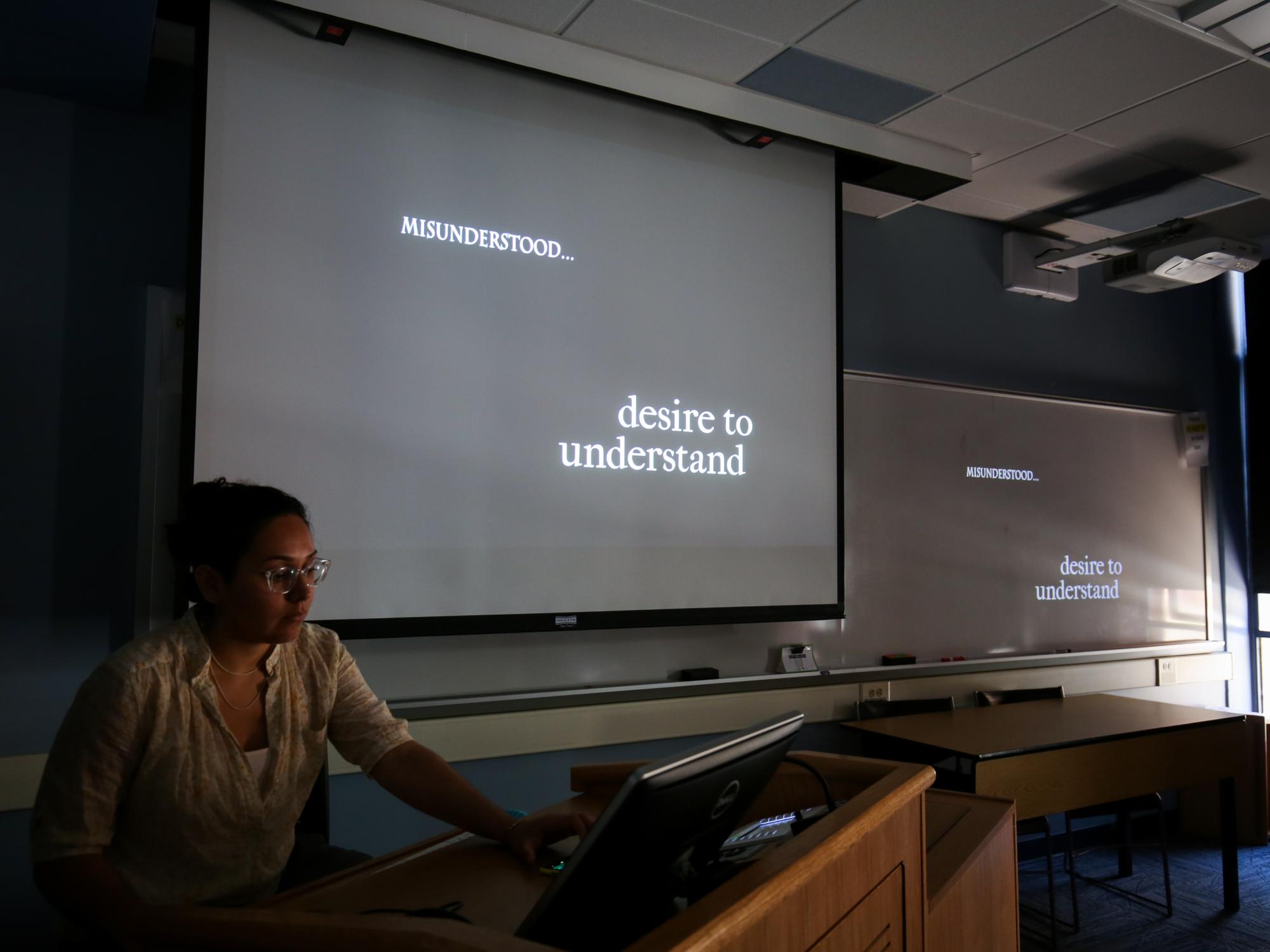 Nicky Jara screens a student film in class.