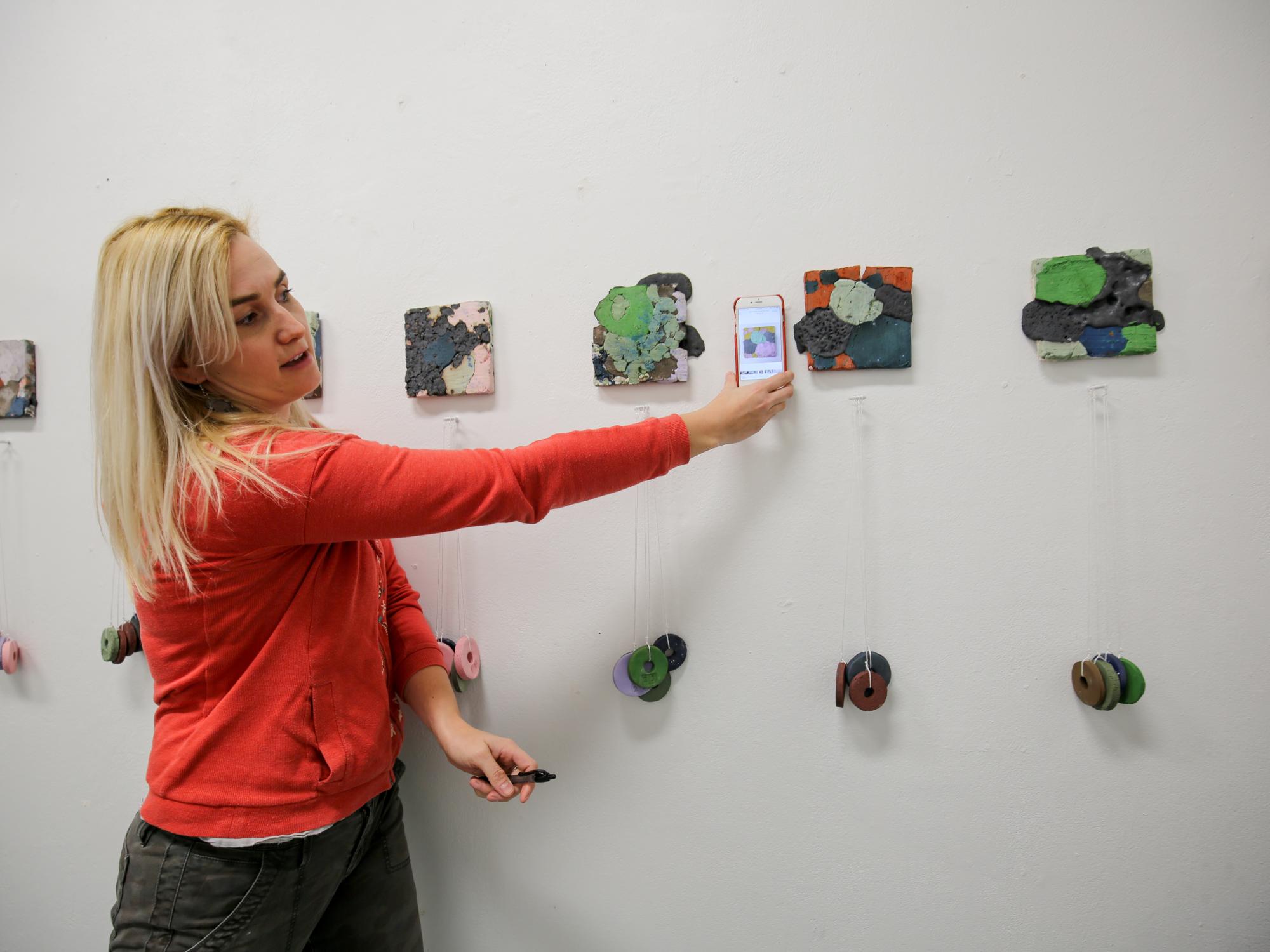 Penelope Van Grinsven gives her presentation on ceramics and color. 