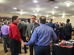 TESC conference attendees talking to each other