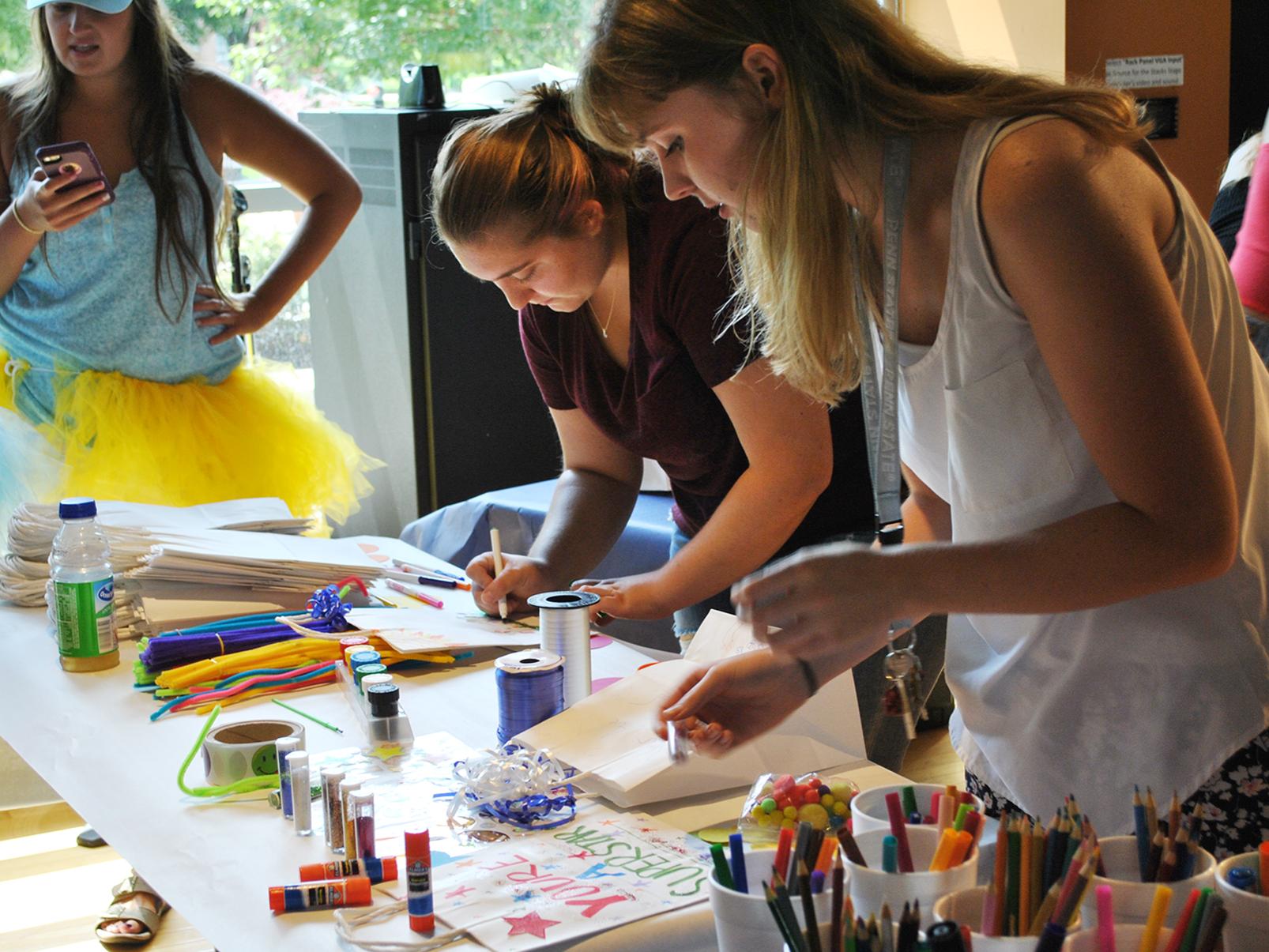 students creating care packages