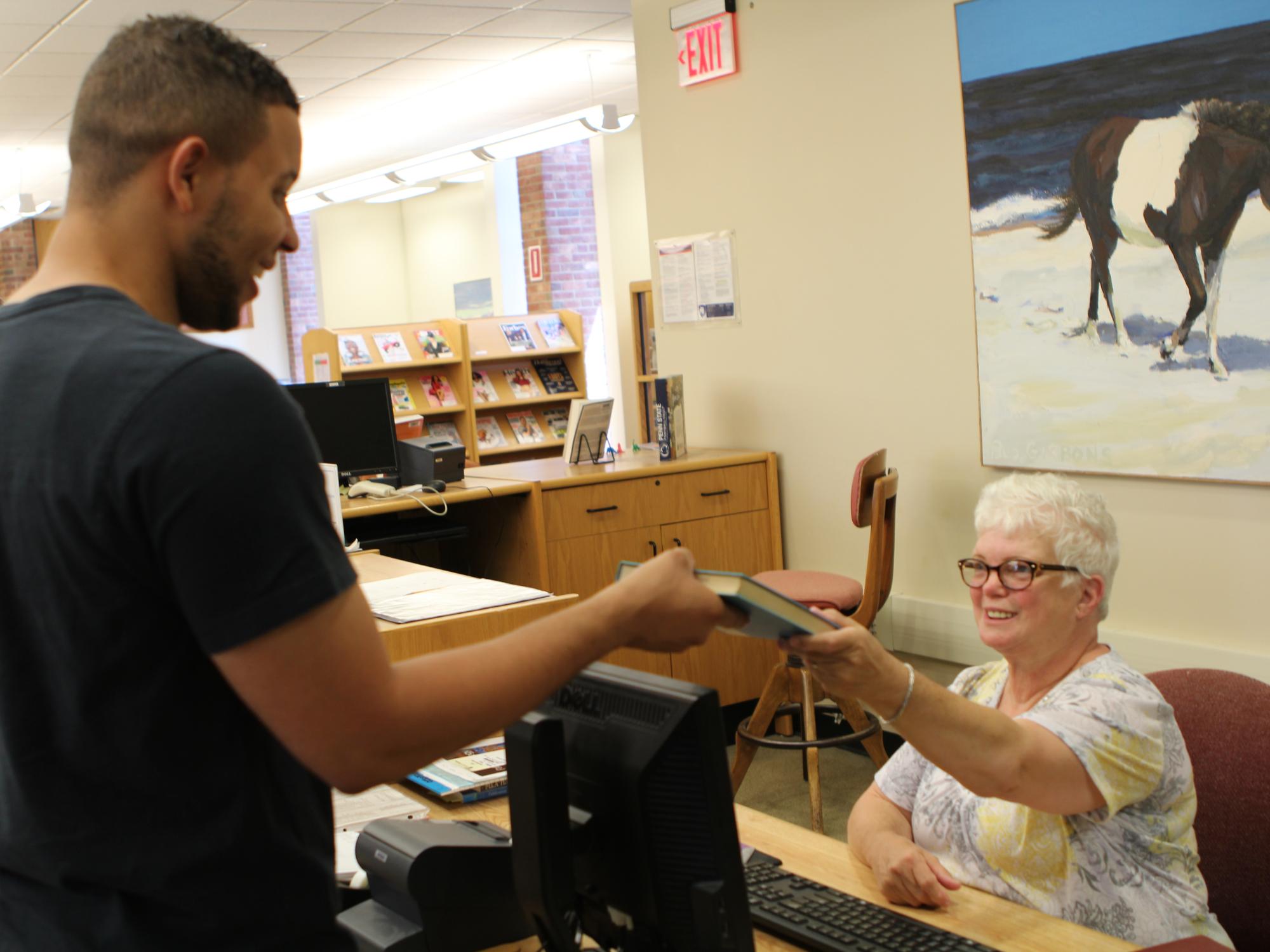 Library staff and student