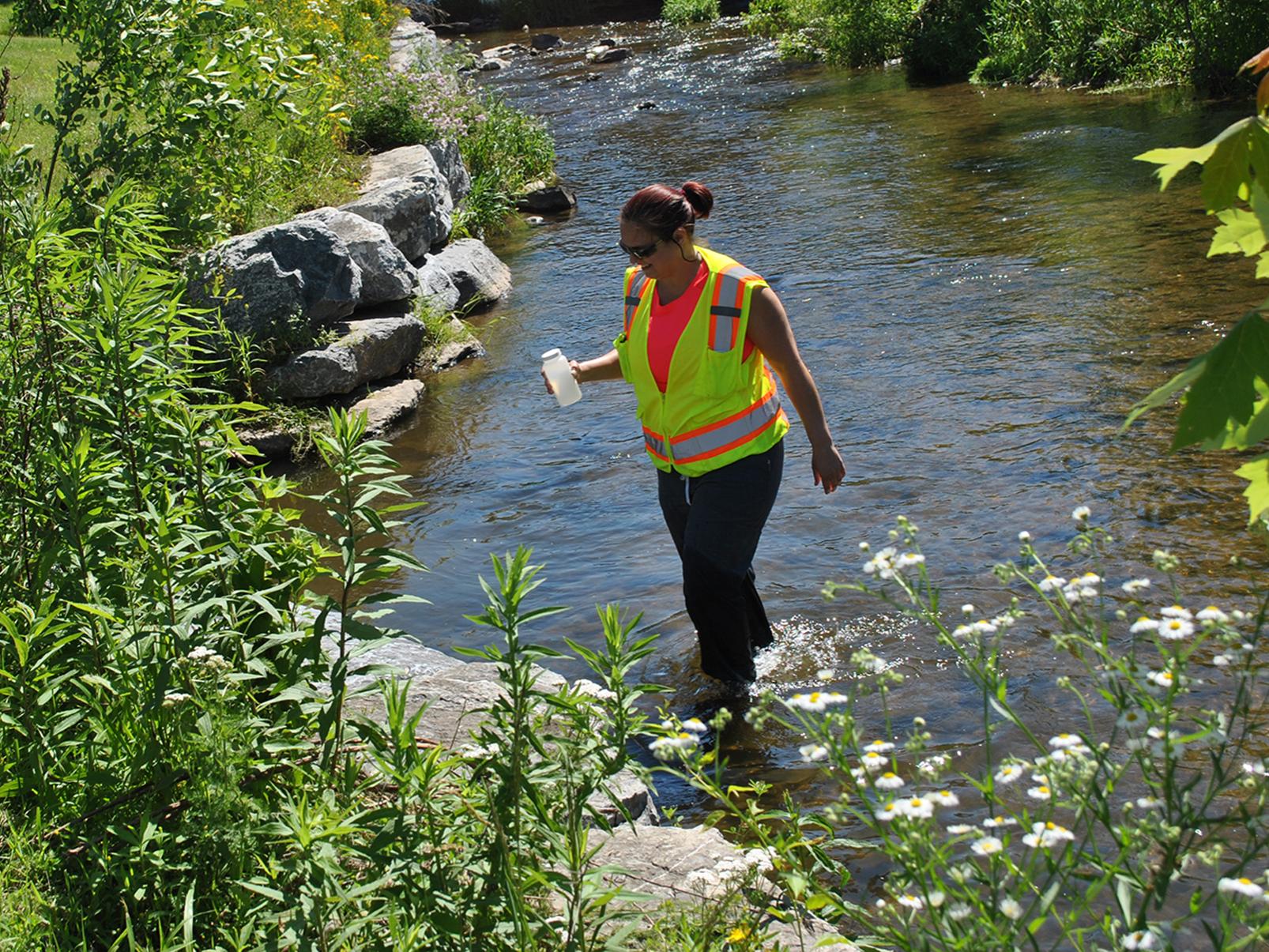 female student in creek