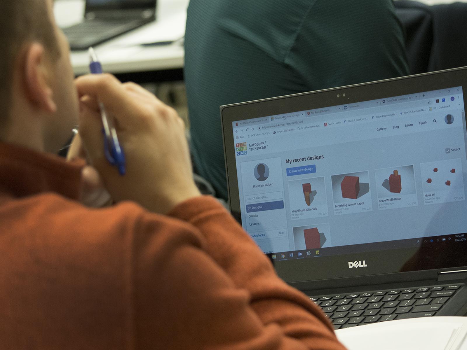 male student with laptop