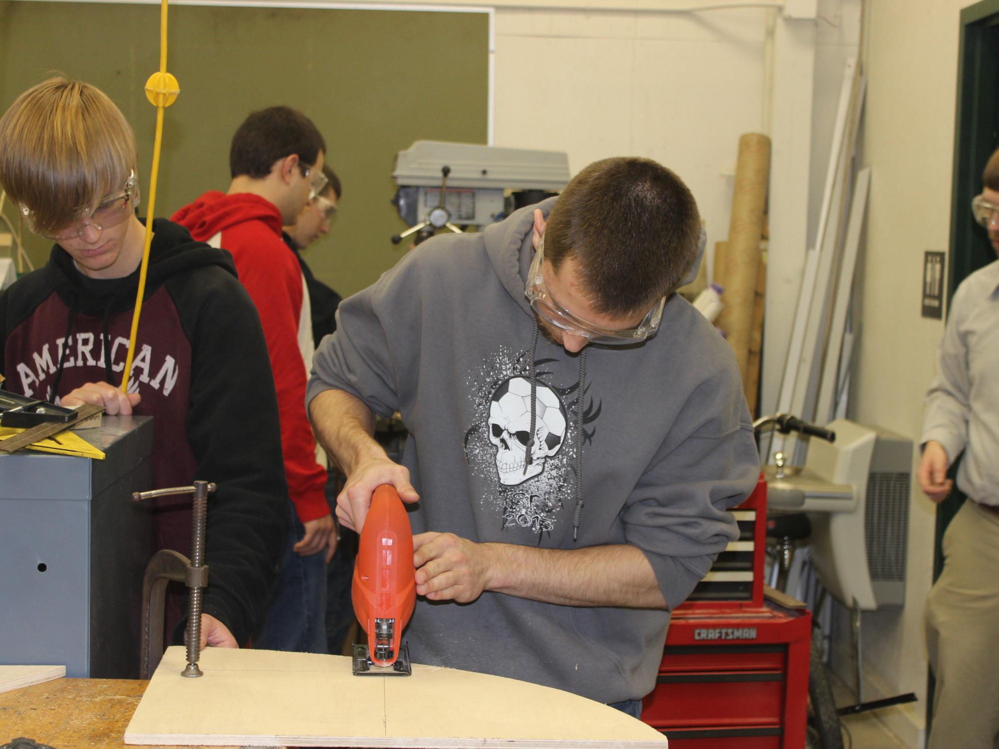 Engineering students Joe Fletcher and Hunter Murray redesign their busy board.