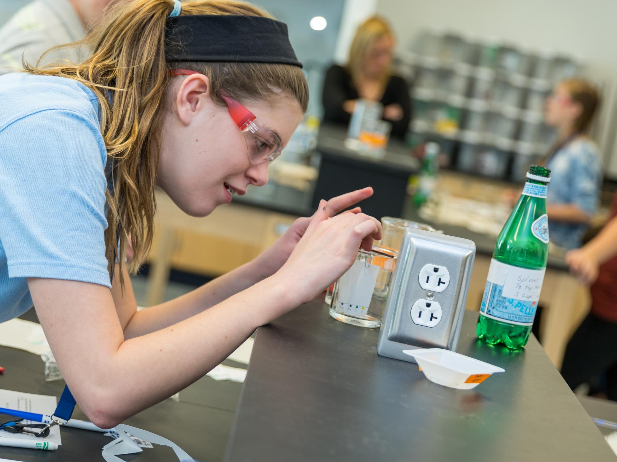 7th-grade girl explore Chemistry 