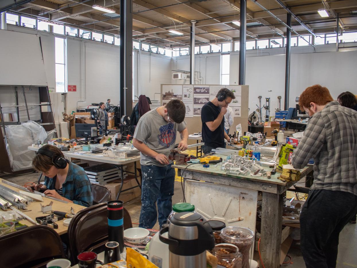 A group of architecture undergraduate students help assemble the chapel.