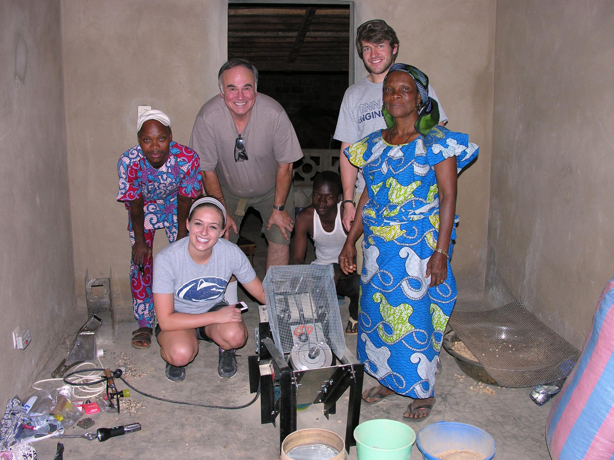 Team poses with baobab cooperative