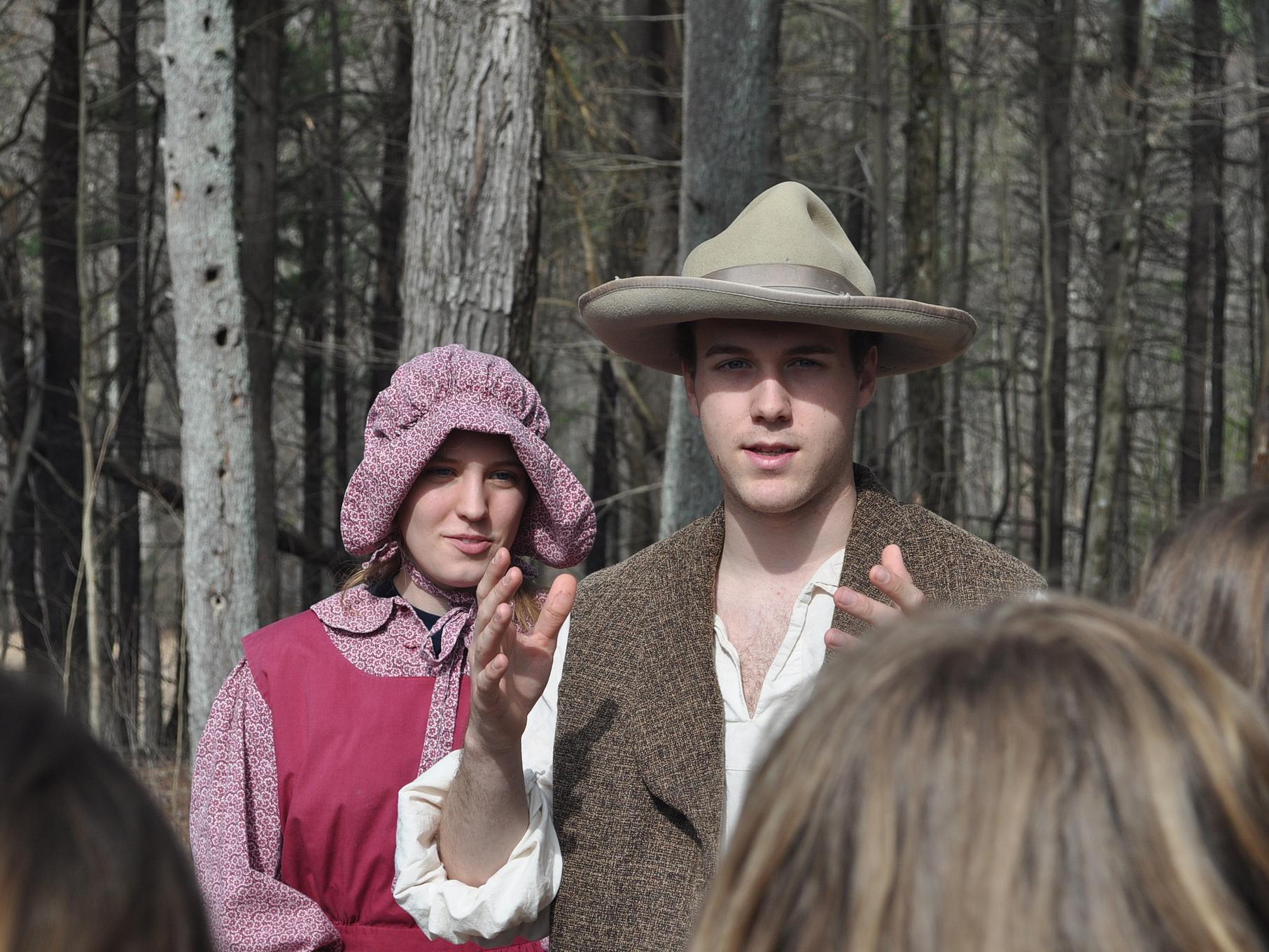 Costumed students explain maple syrup production