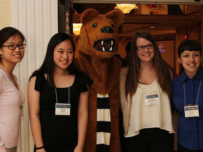 Students pose with the Nittany Lion