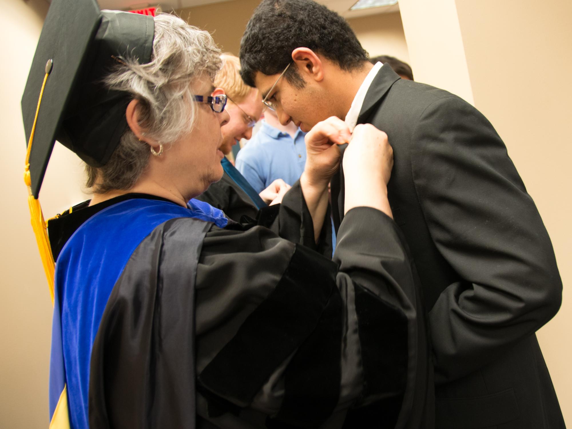 Dr. Cantalupo pins Darshan Shah.