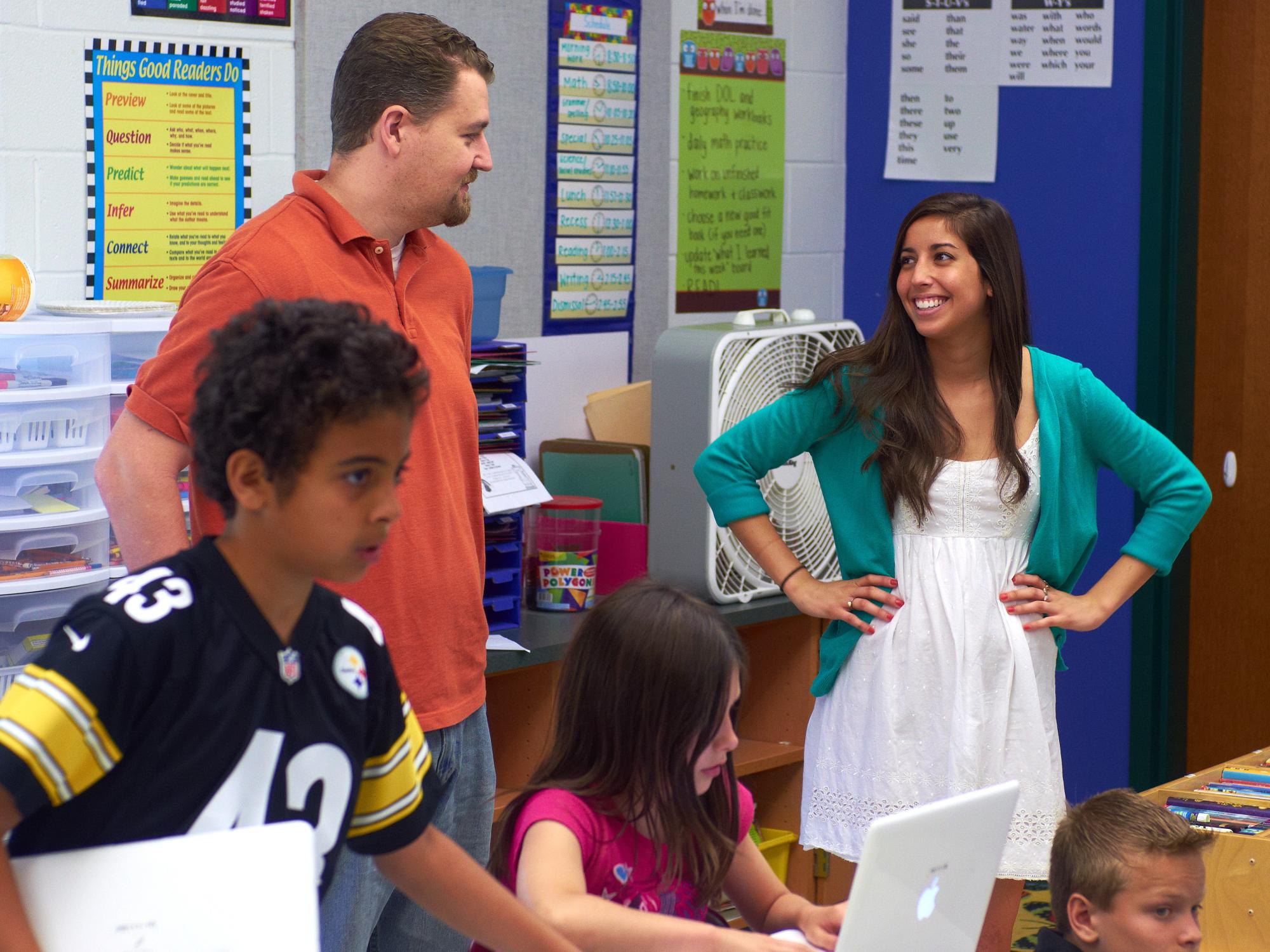 Lauren Jeffrey (right), PDS Intern, speaking with Nick Reitz, her PDS mentor at Park Forest Elementary.