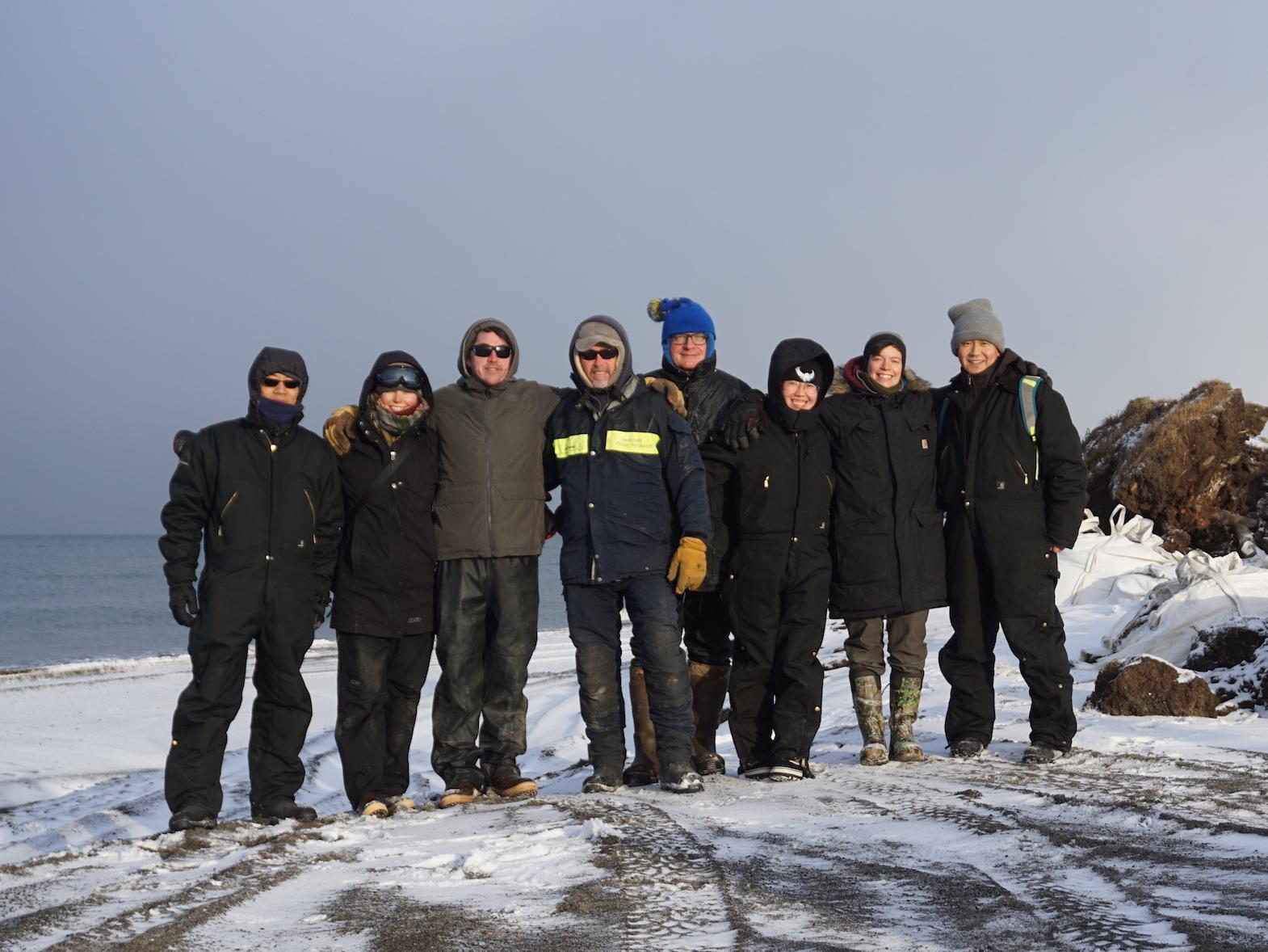 Group of people standing on snow