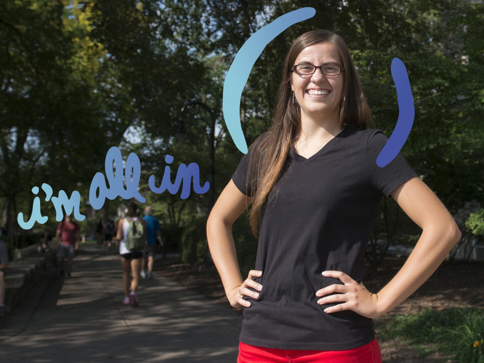 Female student standing with All In