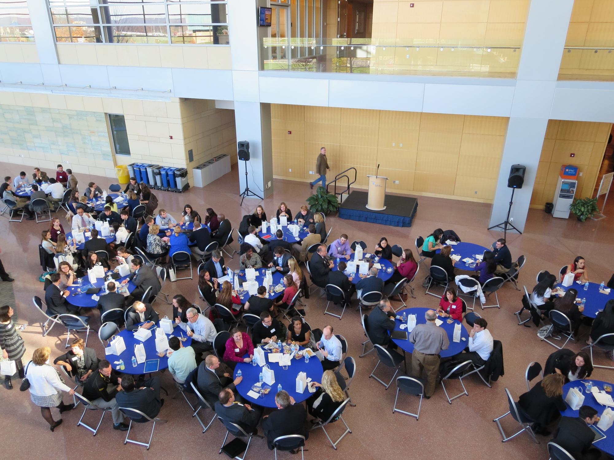 Students and alumni talk during a luncheon held last fall through the Smeal Mentoring Program.