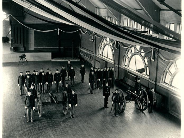 Cadets stand in the Armory in 1894